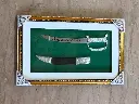 green lama dagger.webp